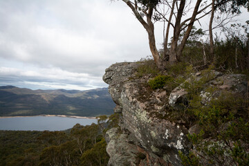 View of a lake and mountains from a mountain top