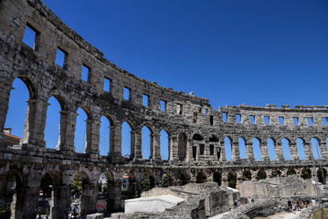 Pula, Croatia - 07 07 2022: Photography of ancient walls and architectural detail of arena in Pula...