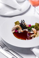 Panna cotta with smoked eel and rose wine