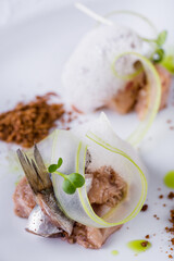 Cod liver with tulle and glass of wine