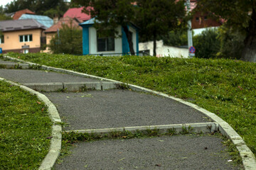 An alley on a street with houses