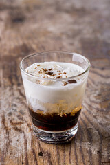 Cocktail with chocolate, ice, ice cream and nuts