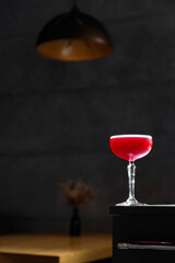 Red cocktail with syrup