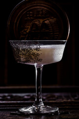 Cocktail with foam, poppy seeds