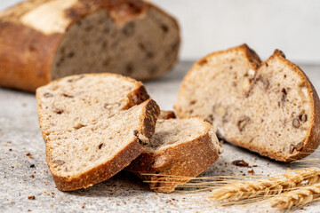 Whole wheat bread, wholemeal bread on vintage background