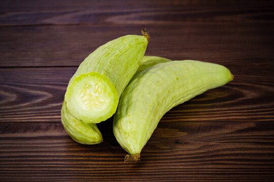 Armenian cucumber on the 
wooden background