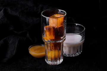 Cocktail with marmalade, caramel and milk