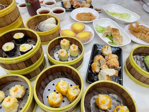 Famous Steamed Hong Kong Dim Sum Served In Bamboo Container