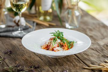 Portion of gourmet italian penne arrabbiata dish
