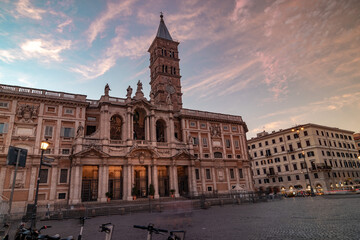 Fototapeta premium Red sunset over the marvelous facade of the Basilica of Santa Maria Maggiore in Rome, Italy.