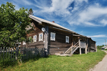 One of the most beautiful villages of Karelia Kinerma in summer. The old wooden house has been well preserved to our time. The concept of travel in Russia.