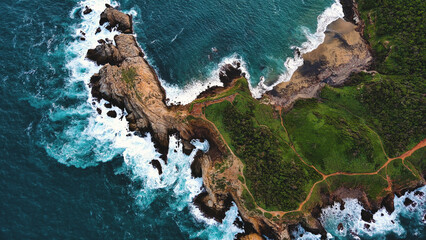 aerial top down of punta cometa pacific ocean cliff waves view in mazunte Oaxaca Puerto Escondido surf hippie travel holiday destination 