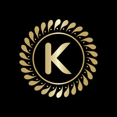  Initial K Golden leaf and circle logo design vector. Golden beauty K Logo and business symbol and alphabets vector design