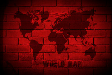 A map of the world painted on a brick wall.