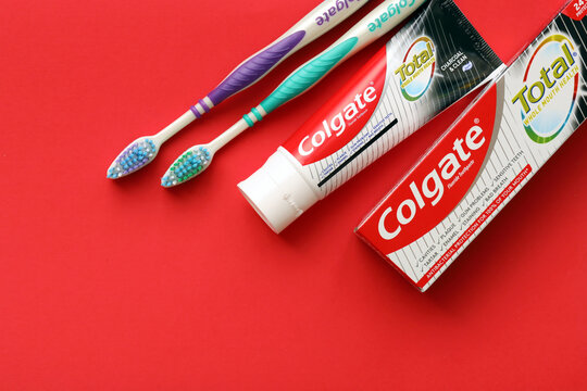 TERNOPIL, UKRAINE - JUNE 23, 2022: Colgate toothpaste and toothbrushes, a brand of oral hygiene products manufactured by American consumer-goods company Colgate-Palmolive
