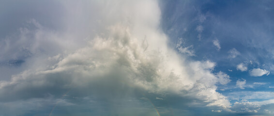 Fototapeta na wymiar Fantastic clouds against blue sky, panorama