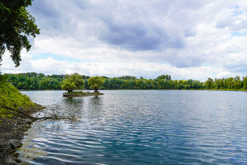 Rohrhofer See near Bruehl. Lake with surrounding nature in Baden-Württemberg.
