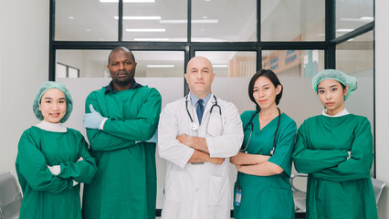 Group Portrait of a doctor and nurses in uniform at the hospital.
