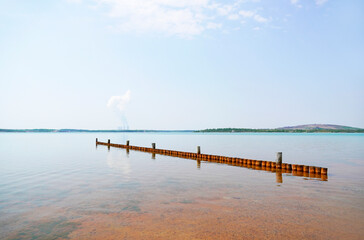 Fototapeta premium View of the Störmthaler See near Leipzig. Landscape with a lake and the surrounding nature in Saxony. 