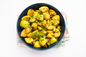 Indian style Tinda or Tinde ki Sabzi also called Indian squash, round melon, Indian round gourd or Indian baby pumpkin, stuffed, stir fried dry or curry recipe