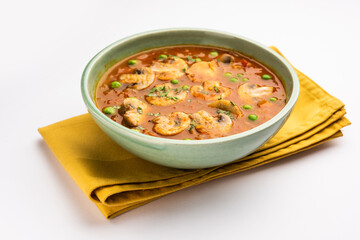 Mushroom and Pea Curry with Roasted Garlic, Indian food served in a bowl