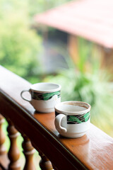 cup of coffee in the cafe. two cups of coffee on the terrace front table