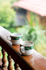cup of coffee in the cafe. two cups of coffee on the terrace front table