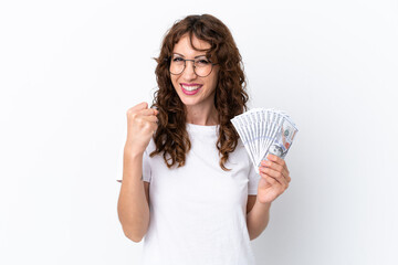 Young woman with curly hair taking a lot of money isolated background on white background...