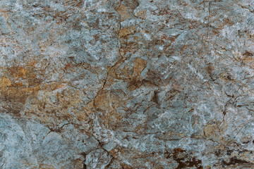 natural textured gray stone with yellow and brown veins