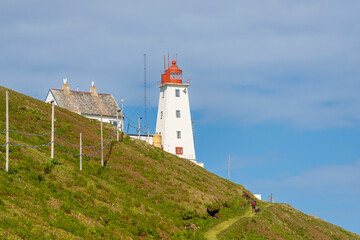 Fototapeta na wymiar Lighthouse at Nature Reserve on Hornoya Island, Varanger Penisula, Norway. 
