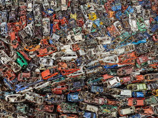Junkyard Abandoned Cars Aerial View. Top Down View. Vehicle Demolition. Car Dump. Industrial Aerial Background. 