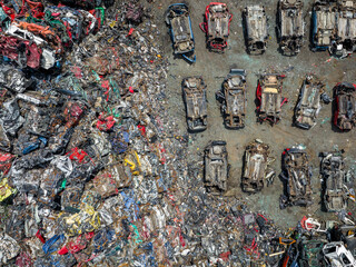 Junkyard Abandoned Cars Aerial View. Top Down View. Vehicle Demolition. Car Dump. Industrial Aerial Background. 