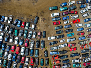 Junkyard Abandoned Cars Aerial View. Top Down View. Vehicle Demolition. Car Dump. Industrial Aerial Background. 