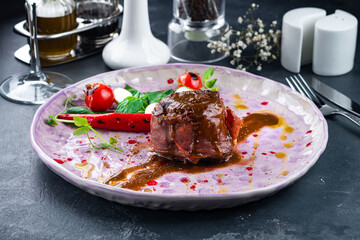 filet mignon steak served on a plate