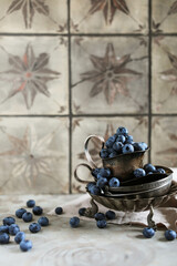 Fresh blueberries in a vintage bowl. Summer berries, minimalistic shot.