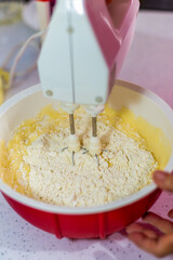 Mix flour and eggs to make cake