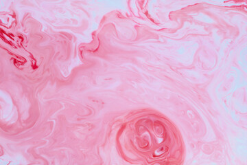 Abstract pink backdrop on liquid. Pastel pink fluid patterned background. Fluid Art