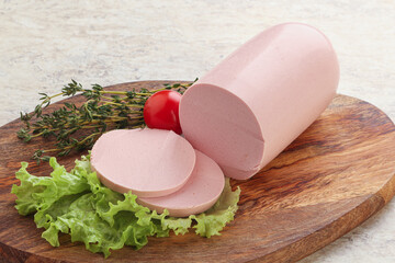 Boiled sausage with two slices