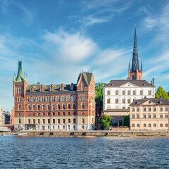 Norstedt Building, or Norstedtshuset, and tower of Riddarholmen Church, located in the island of...