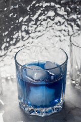 Anchan, Thai blue tea Chang Shu. Cold drink. Useful for nerves and produces a systemic excellent cosmetic effect.