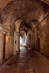 Fototapeta na wymiar Medieval street in Perugia historic center, Umbria Italy