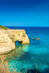 SALENTO, ITALY, 11 AUGUST 2021 The beautiful crystal clear Sea of Apulia from the cliffs and the...