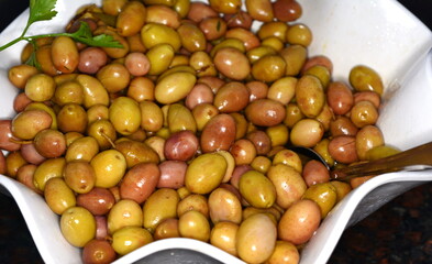 olives in the market. Background of olives close up. Healthy food background. Food concept.