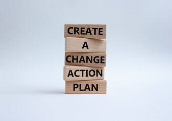 Create a change action plan symbol. Business Concept words Create a change action plan on wooden blocks. Beautiful white background. Business and Create a change action plan concept. Copy space