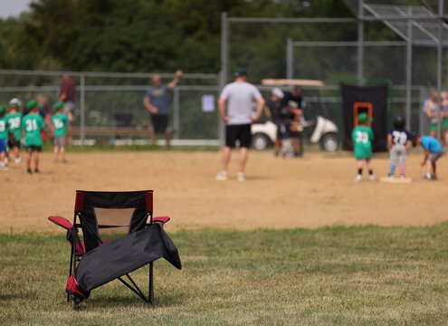 Absent Parent At Baseball Game