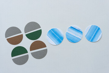 whole and half paper circles on blank paper