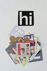 hi (and pile of hi stencils) on blank paper