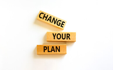 Change your plan symbol. Concept words Change your plan on wooden blocks on a beautiful white table white background. Business, finacial and change your plan concept. Copy space.