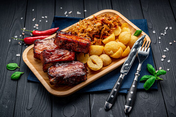 Barbecue pork ribs as main dish at restaurant.