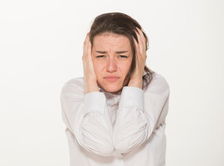 portrait of a girl in a white shirt isolated.close-up portrait of a young girl in a white shirt on a white background isolated.emotions joy happiness surprise calmness chagrin.win lose.